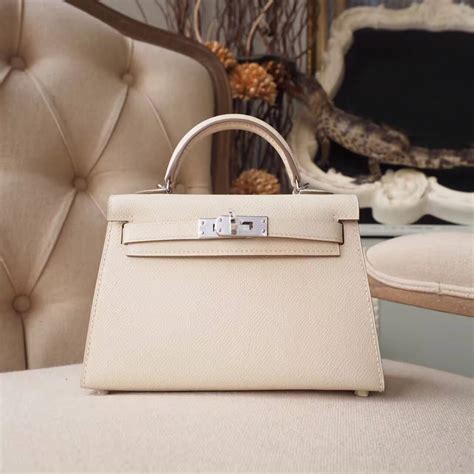 Like new mini kelly bag is for sale beige color Hermes 